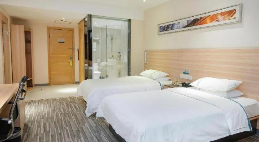 Bed in City Comfort Inn Yichang Gezhouba CBD Shopping Center