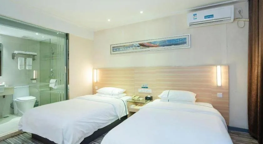Bed in City Comfort Inn Yichang Gezhouba CBD Shopping Center