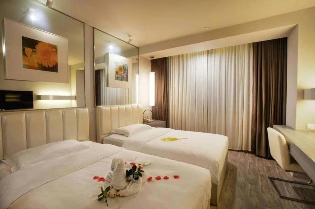 Bed in Jinjiang Metropolo Hotel - Qingdao Chengyang District Government