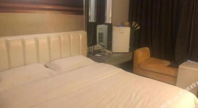 Bed in Jinjiang Metropolo Hotel - Qingdao Chengyang District Government