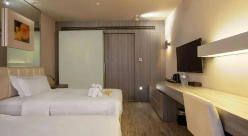 Bed in Jinjiang Metropolo Hotel - Qingdao Chengyang District Government