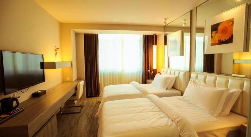 Bed in Jinjiang Metropolo Hotel - Qingdao Chengyang District Government