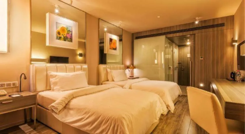 Bed in Jinjiang Metropolo Hotel - Qingdao Chengyang District Government