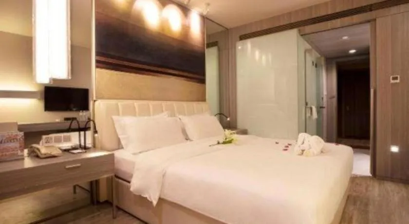 Bed in Jinjiang Metropolo Hotel - Qingdao Chengyang District Government