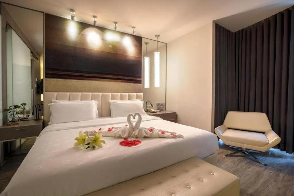 Bed in Jinjiang Metropolo Hotel - Qingdao Chengyang District Government