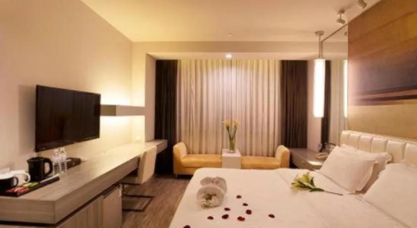 Bed in Jinjiang Metropolo Hotel - Qingdao Chengyang District Government