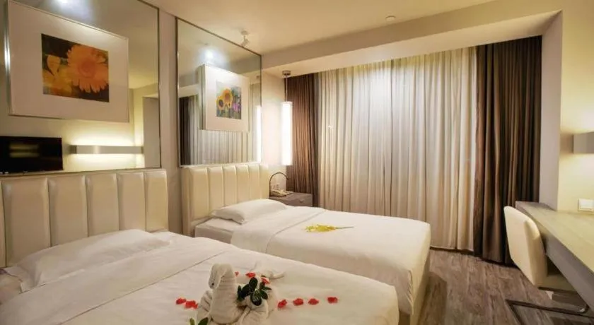 Bed in Jinjiang Metropolo Hotel - Qingdao Chengyang District Government