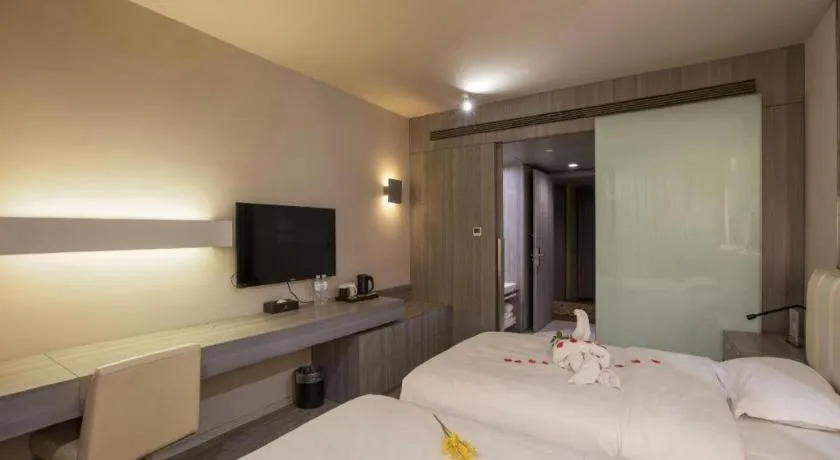 Bed in Jinjiang Metropolo Hotel - Qingdao Chengyang District Government