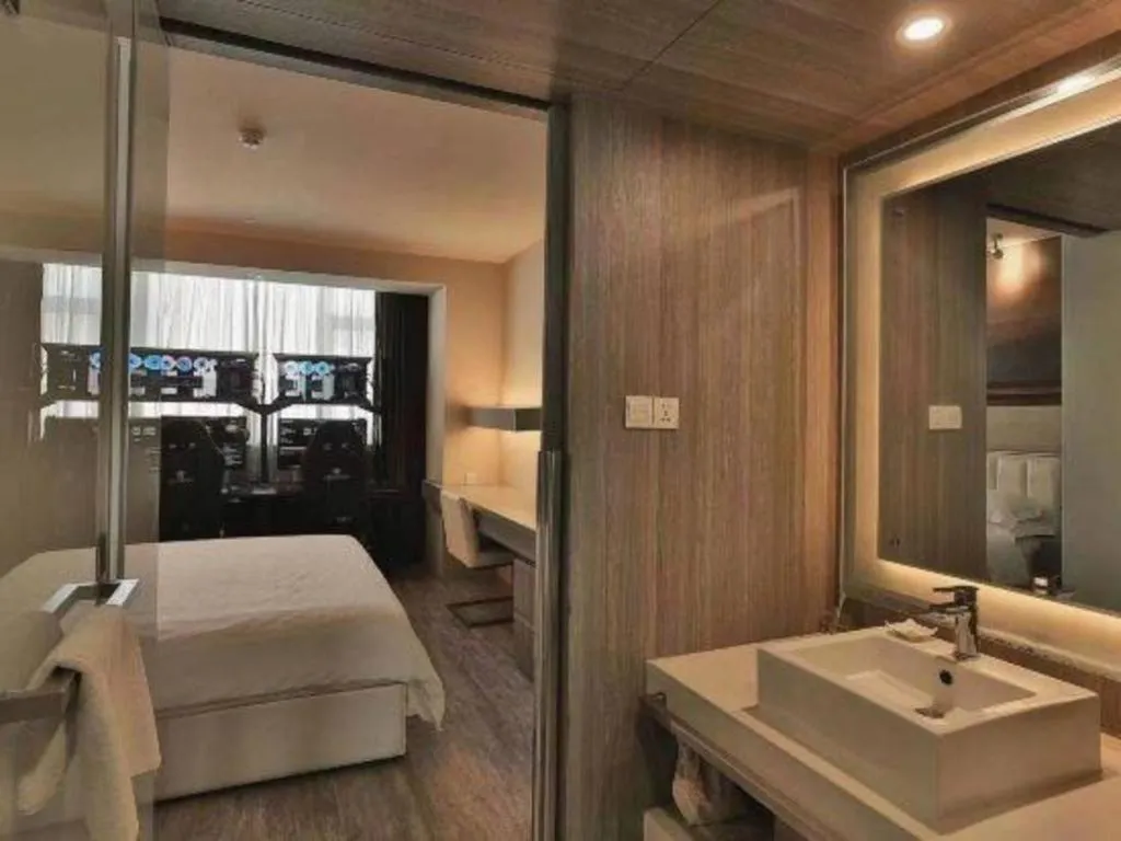 Bed in Jinjiang Metropolo Hotel - Qingdao Chengyang District Government