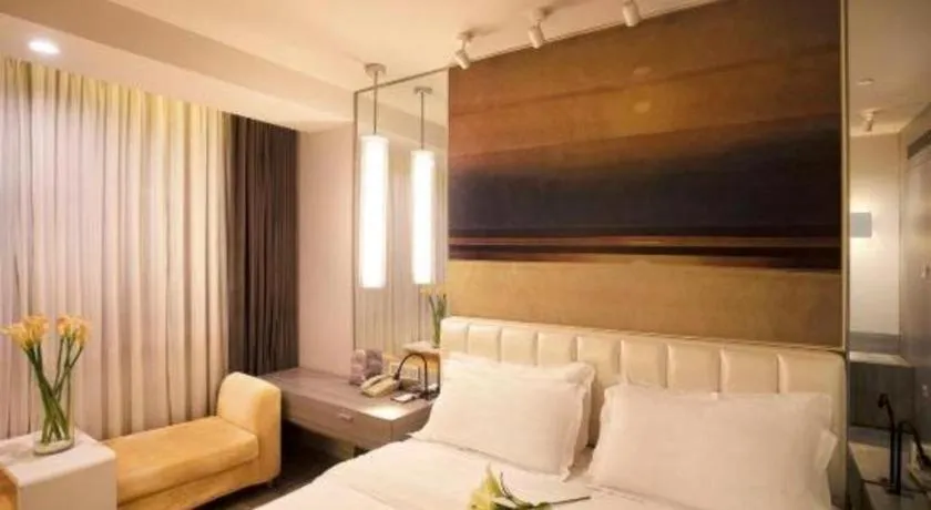 Bed in Jinjiang Metropolo Hotel - Qingdao Chengyang District Government