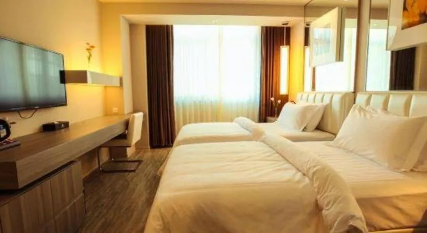 Bed in Jinjiang Metropolo Hotel - Qingdao Chengyang District Government