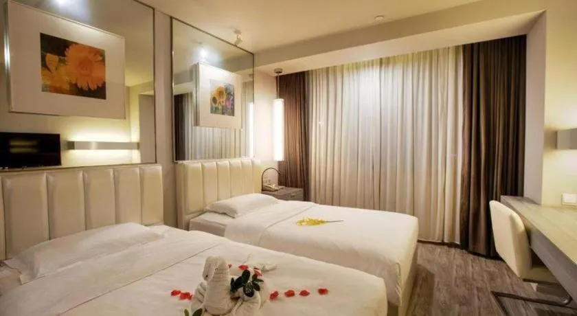 Bed in Jinjiang Metropolo Hotel - Qingdao Chengyang District Government