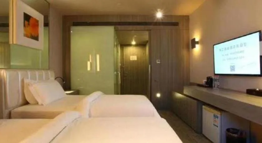 Bed in Jinjiang Metropolo Hotel - Qingdao Chengyang District Government