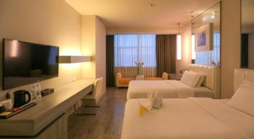 Bed in Jinjiang Metropolo Hotel - Qingdao Chengyang District Government