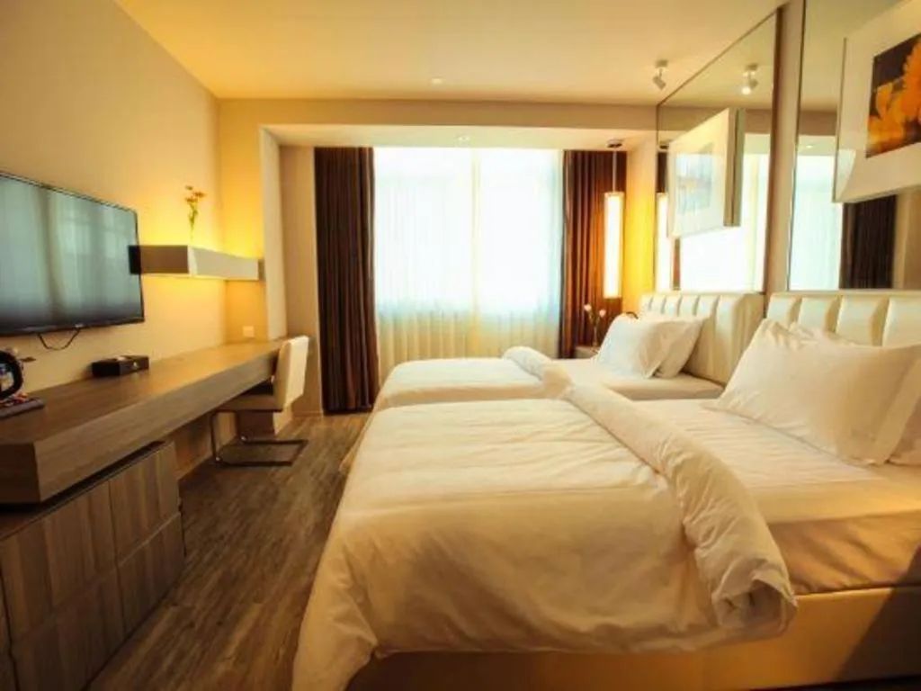 Bed in Jinjiang Metropolo Hotel - Qingdao Chengyang District Government