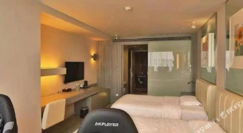 Bed in Jinjiang Metropolo Hotel - Qingdao Chengyang District Government