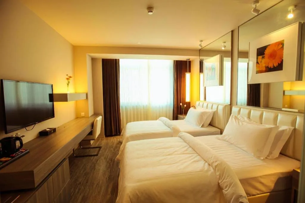 Bed in Jinjiang Metropolo Hotel - Qingdao Chengyang District Government