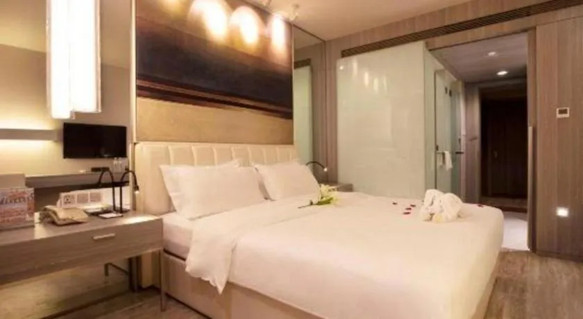 Bed in Jinjiang Metropolo Hotel - Qingdao Chengyang District Government