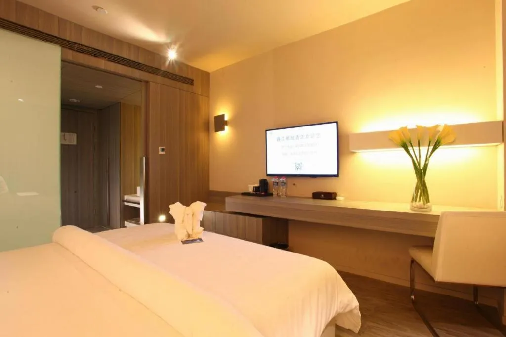 Bed in Jinjiang Metropolo Hotel - Qingdao Chengyang District Government