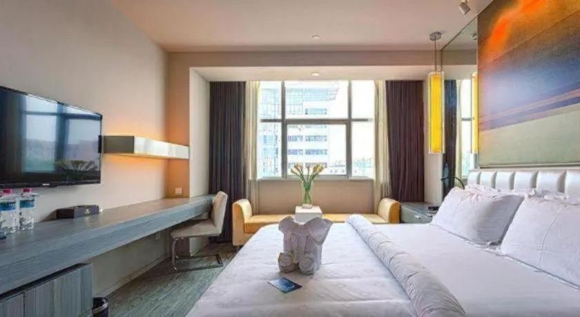 Bed in Jinjiang Metropolo Hotel - Qingdao Chengyang District Government