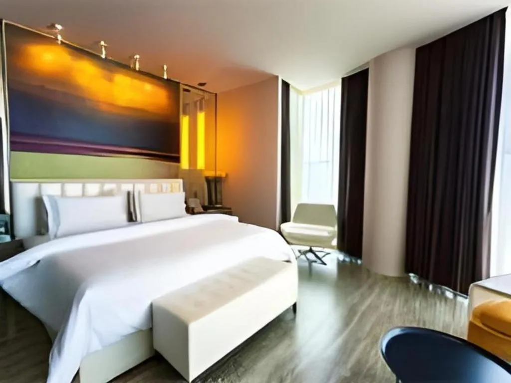 Bed in Jinjiang Metropolo Hotel - Qingdao Chengyang District Government