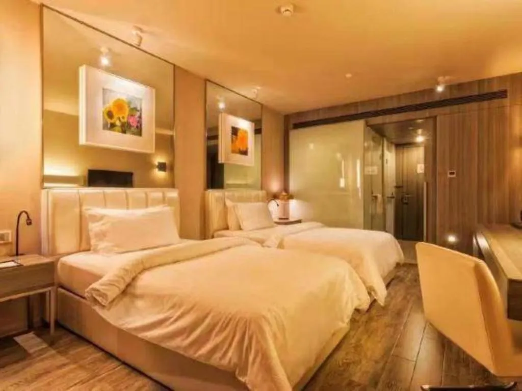 Bed in Jinjiang Metropolo Hotel - Qingdao Chengyang District Government