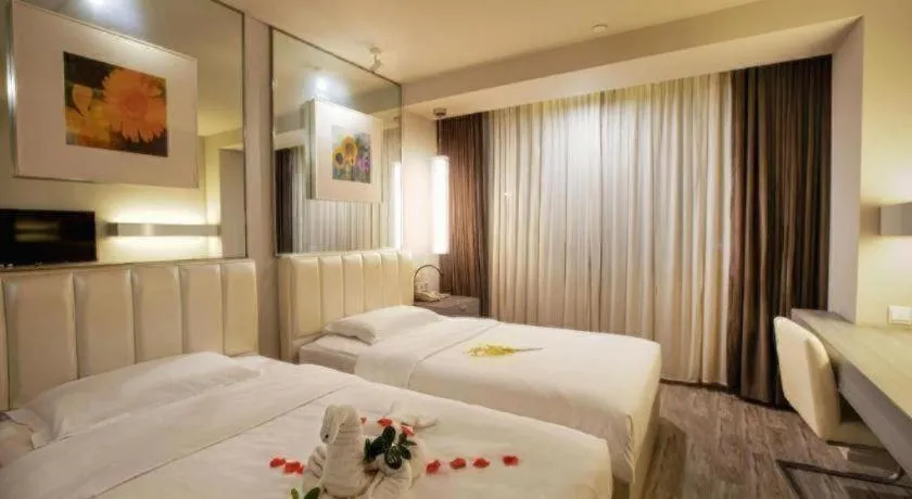 Bed in Jinjiang Metropolo Hotel - Qingdao Chengyang District Government