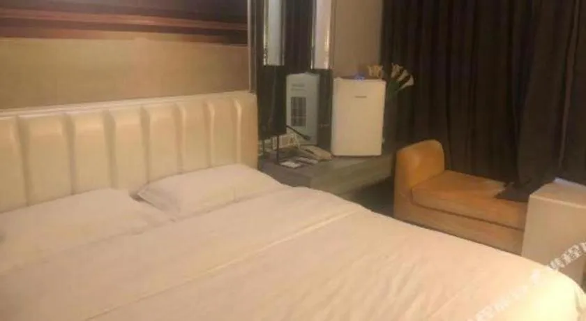 Bed in Jinjiang Metropolo Hotel - Qingdao Chengyang District Government