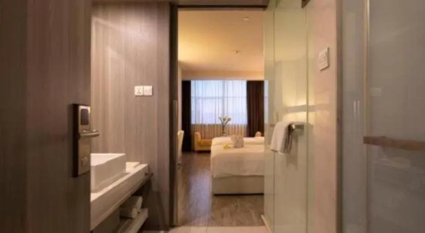 Bed in Jinjiang Metropolo Hotel - Qingdao Chengyang District Government