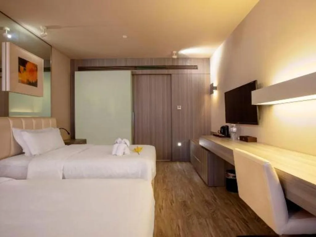 Bed in Jinjiang Metropolo Hotel - Qingdao Chengyang District Government