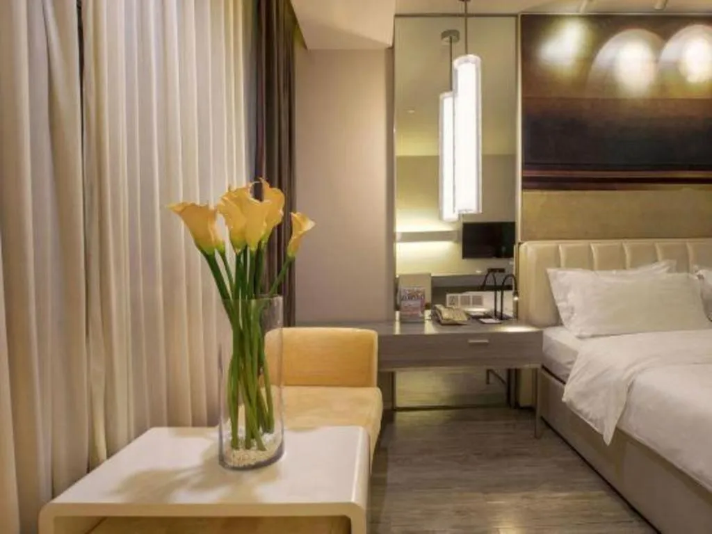 Bed in Jinjiang Metropolo Hotel - Qingdao Chengyang District Government