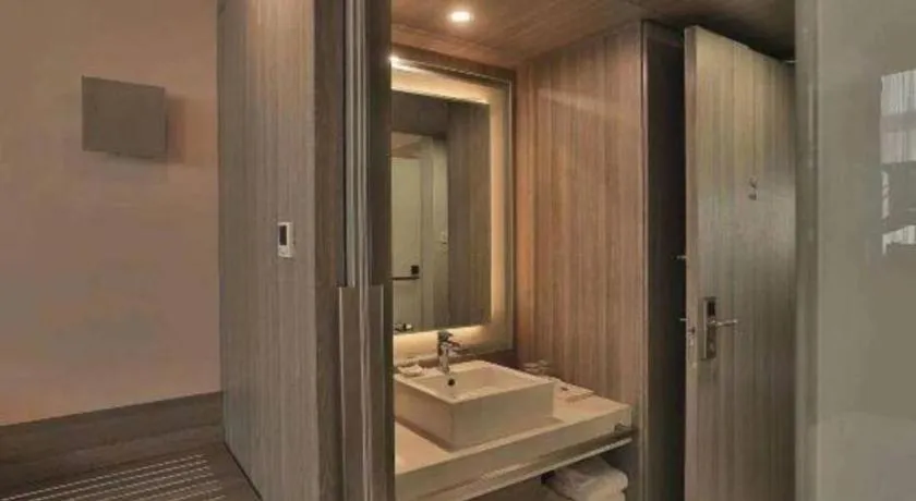 Bed in Jinjiang Metropolo Hotel - Qingdao Chengyang District Government