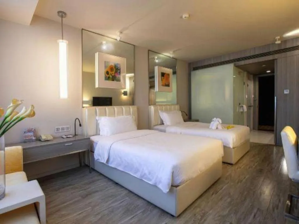 Bed in Jinjiang Metropolo Hotel - Qingdao Chengyang District Government