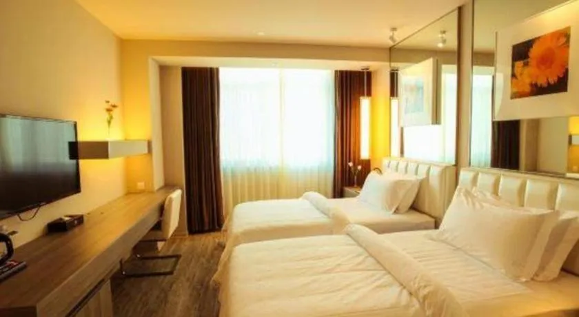 Bed in Jinjiang Metropolo Hotel - Qingdao Chengyang District Government