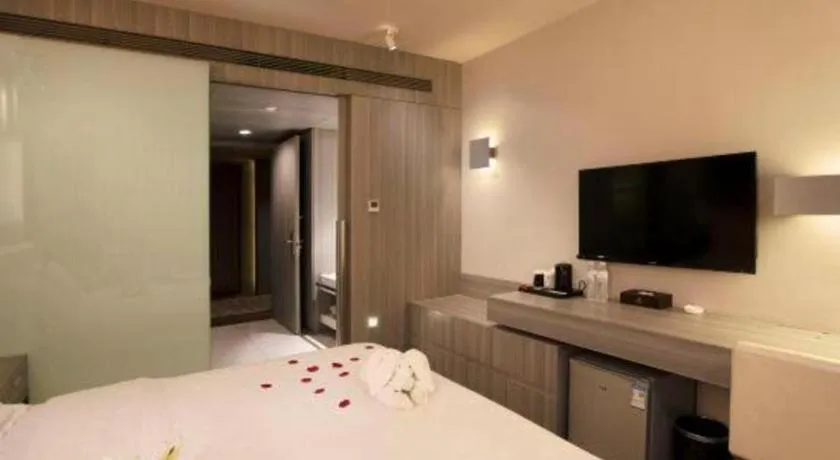 Bed in Jinjiang Metropolo Hotel - Qingdao Chengyang District Government