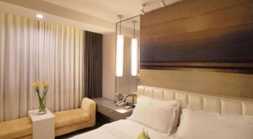 Bed in Jinjiang Metropolo Hotel - Qingdao Chengyang District Government