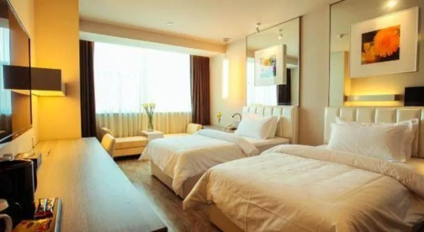 Bed in Jinjiang Metropolo Hotel - Qingdao Chengyang District Government