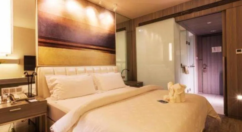 Bed in Jinjiang Metropolo Hotel - Qingdao Chengyang District Government