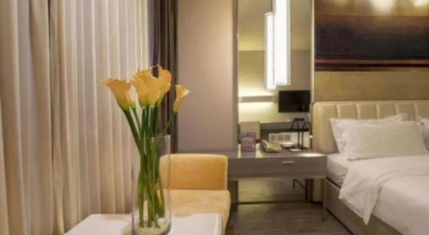 Bed in Jinjiang Metropolo Hotel - Qingdao Chengyang District Government