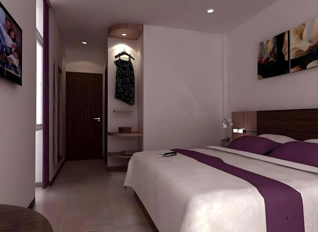 Bed in Amantis Hotel