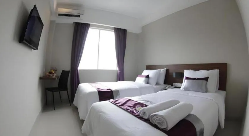 Bed in Amantis Hotel