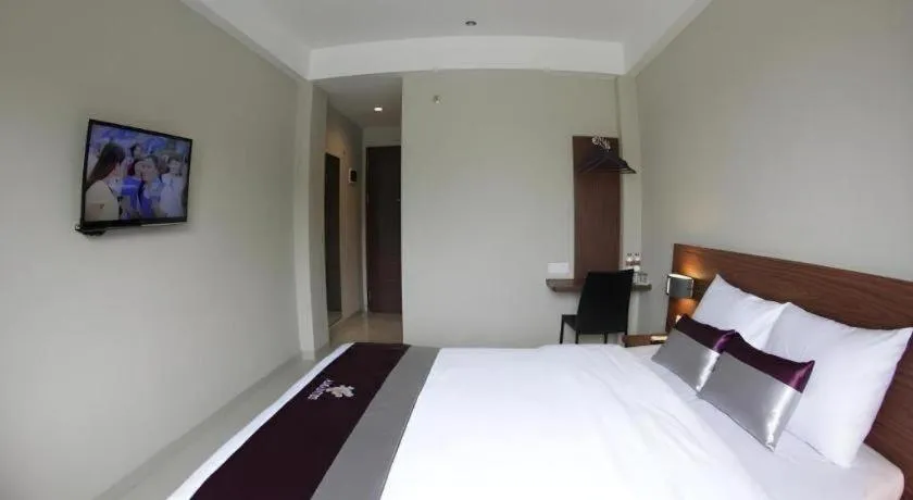 Bed in Amantis Hotel