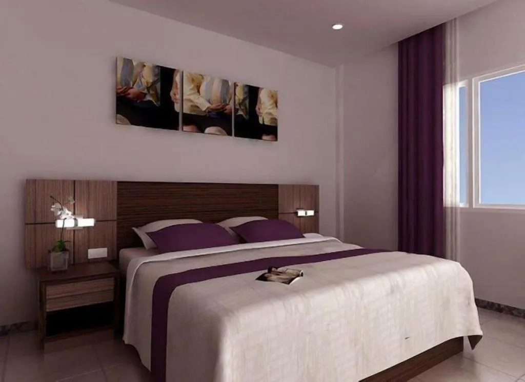 Bed in Amantis Hotel