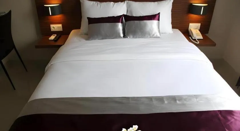 Bed in Amantis Hotel