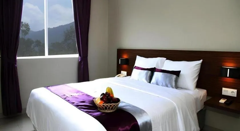 Bed in Amantis Hotel