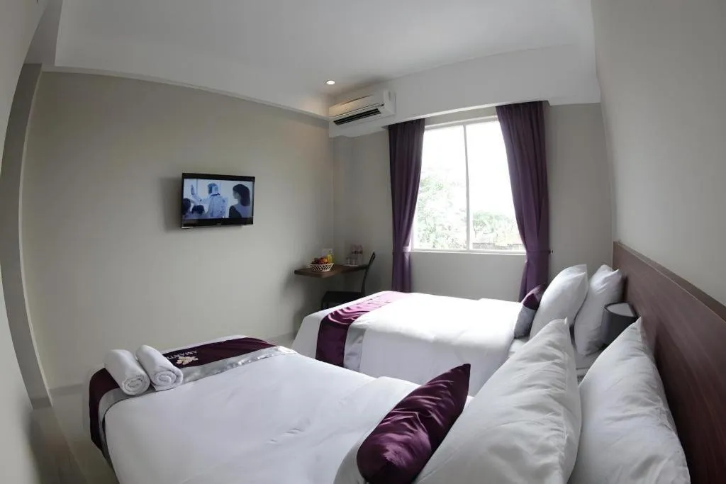 Bed in Amantis Hotel