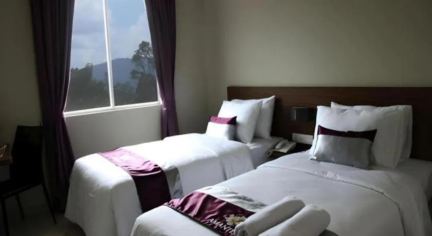 Bed in Amantis Hotel