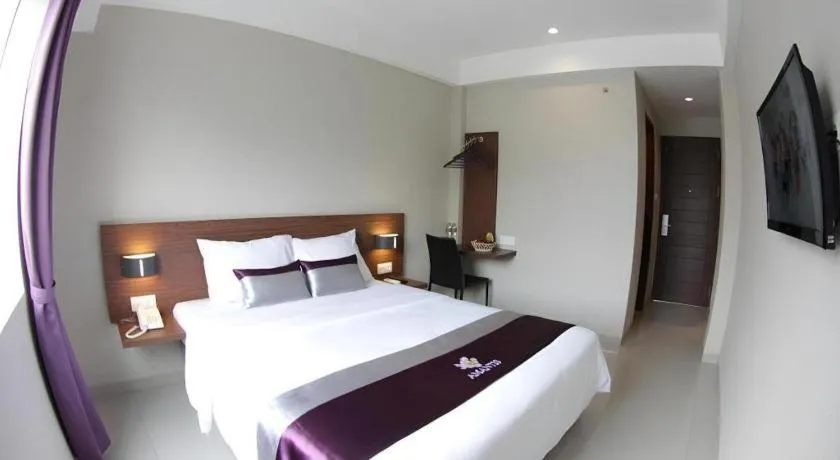 Bed in Amantis Hotel