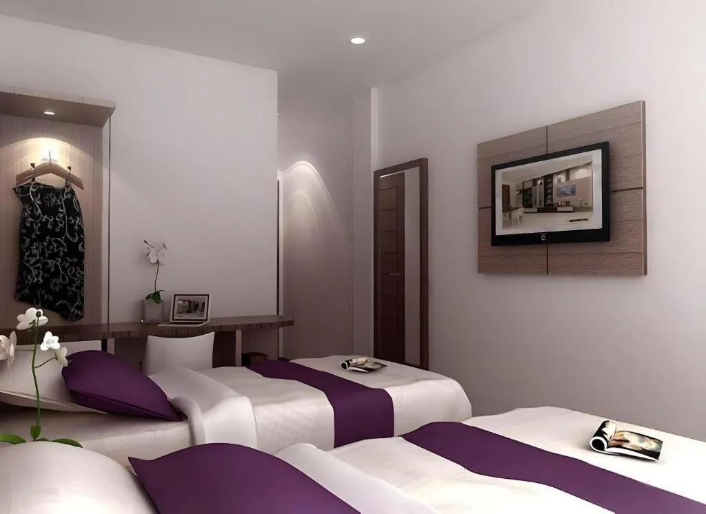Bed in Amantis Hotel