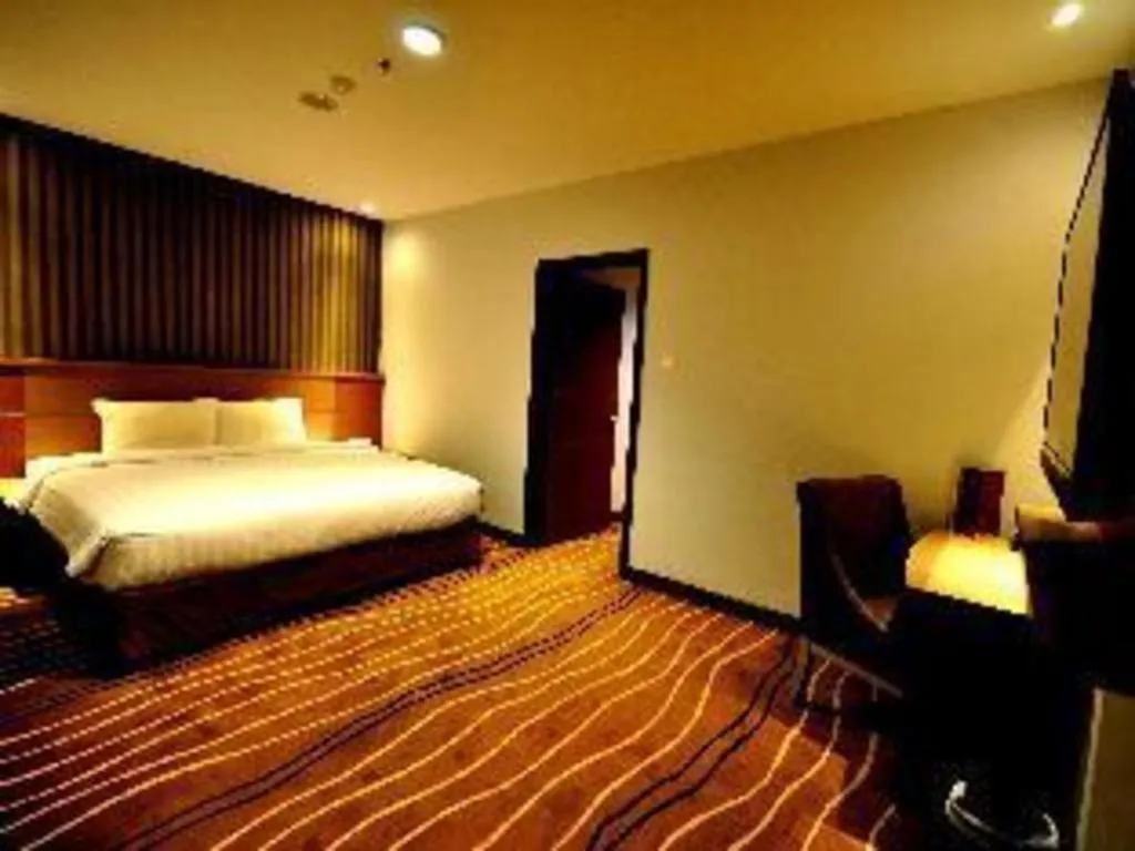 Bed in D Maleo Hotel Makassar